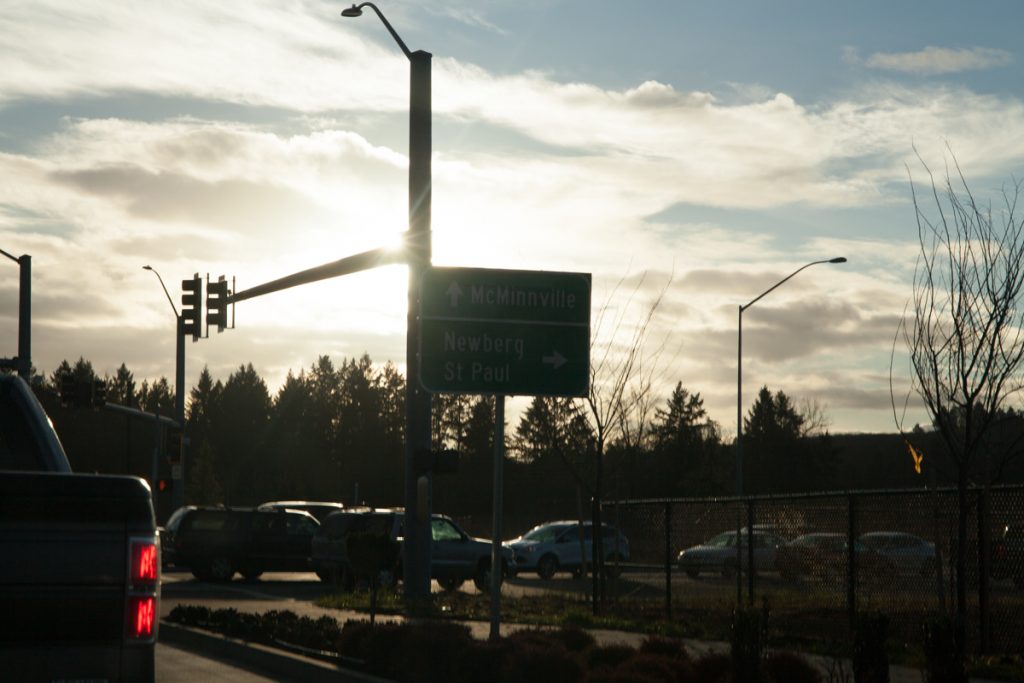 Directional signs for McMinnville and Newberg/St. Paul. I tried to block as much sun as I could to get this shot.