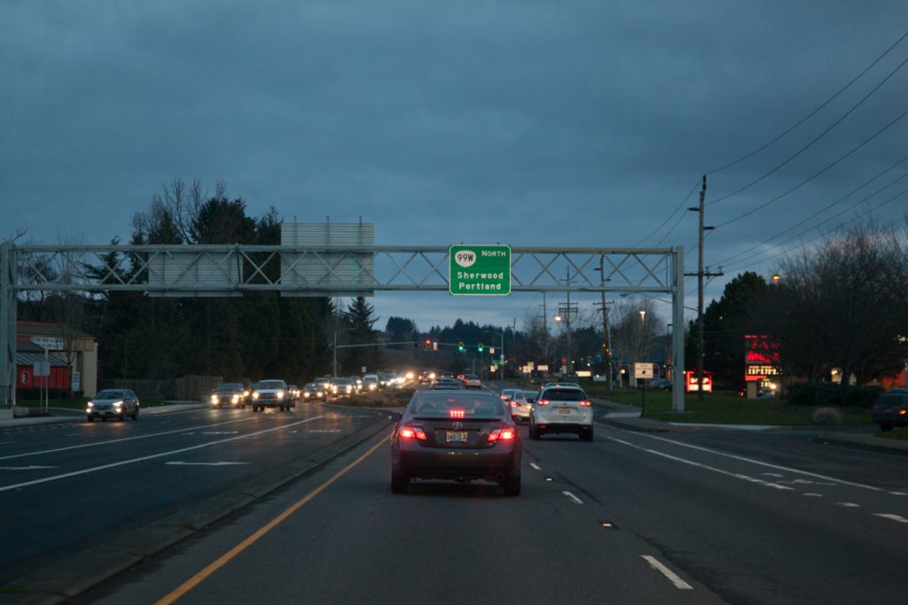 As darkness sets in, one final shot of the sign gantry north of Newberg, reassuring drivers that this takes you back to Portland.