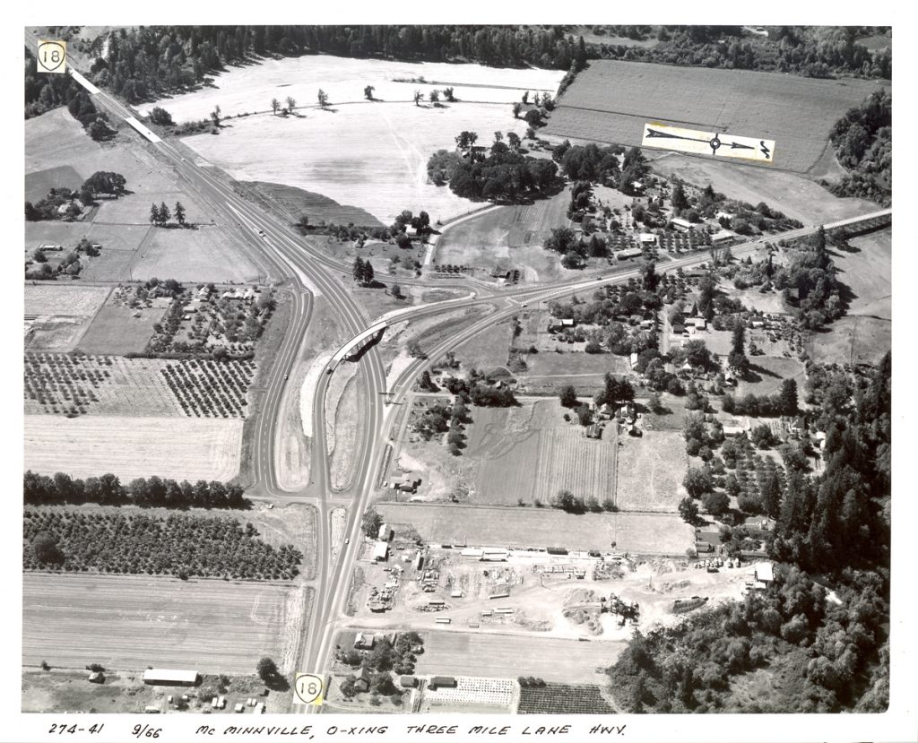 The East McMinnville interchange where Three Mile Lane diverges northwesterly (to the right) from the Salmon River Highway, September 1966. The design of this interchange started causing more accidents as traffic increased, necessitating a redesign (OSHD 274-41)